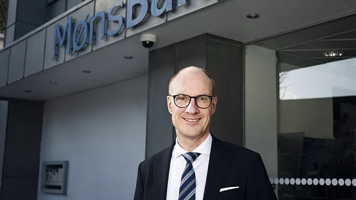 Bankdirektør Per Sjørup er glad, at historien om hans ansættelse i Lollands Bank blev en del af de meste læste erhvervsnyheder 2022